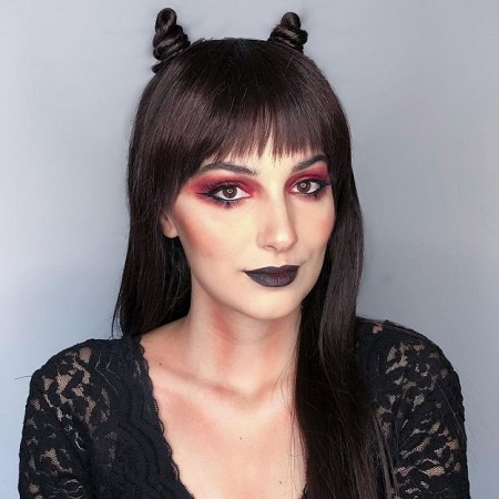 a-girl-with-cute-space-buns-for-horns