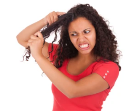 a-woman-combing-her-hair-rudely