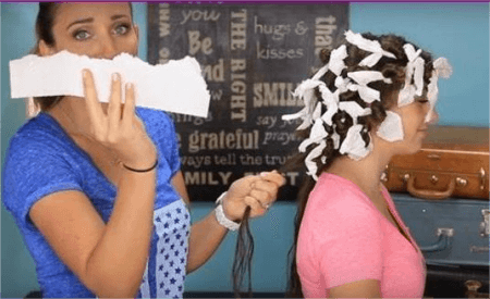 a-woman-making-paper-towel-curls