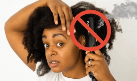 a-woman-using-hair-heating-tools-wrongly