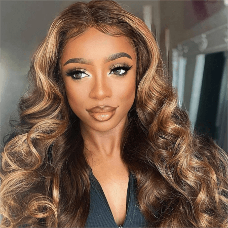 a-woman-wearing-a-honey-blonde-highlight-body-wave-wig