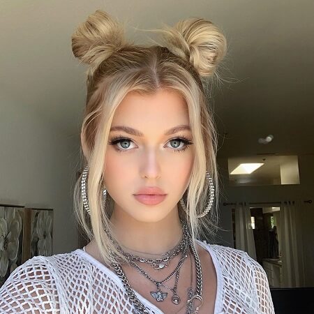 a_girl_with_space_buns
