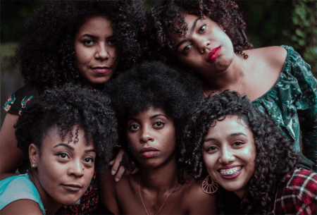 five-women-with-curly-and-coily-hair