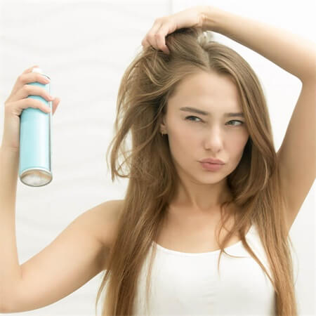 spray-some-dry-shampoo-to-hair-before-workout