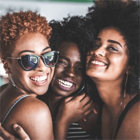 three-women-laughing-with-different-hairstyles